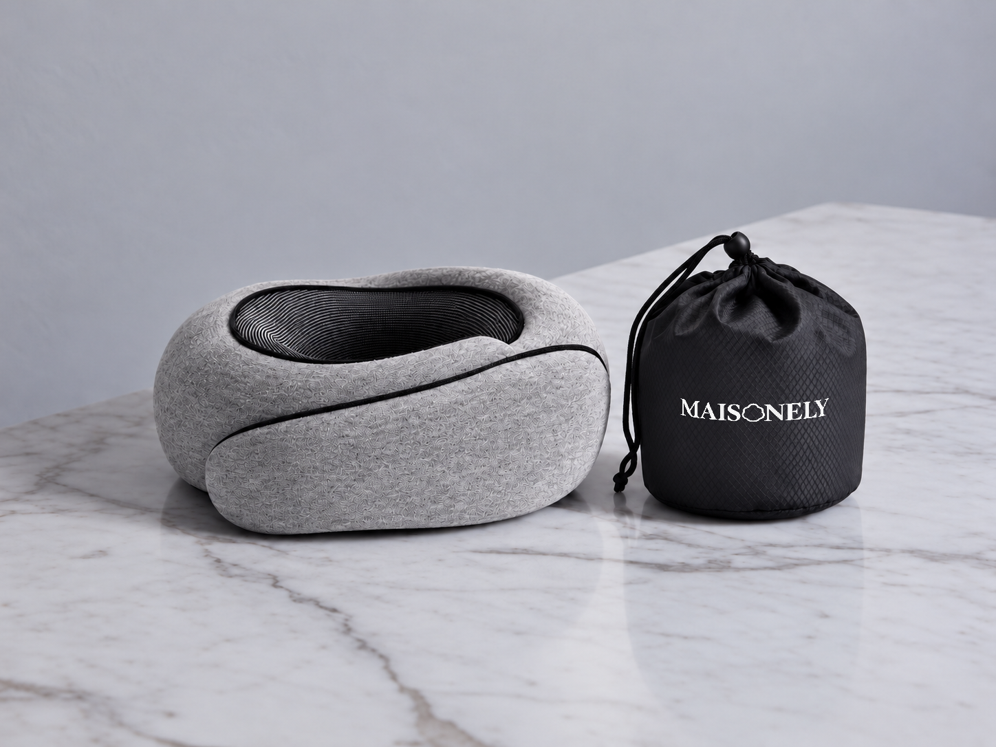 The travel pillow and its carry bag